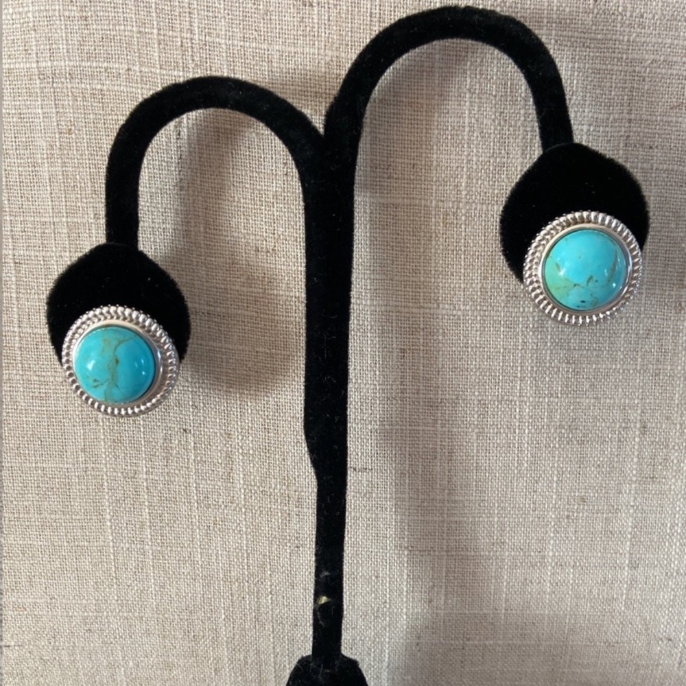 Turquoise and sterling silver bezel set earrings.